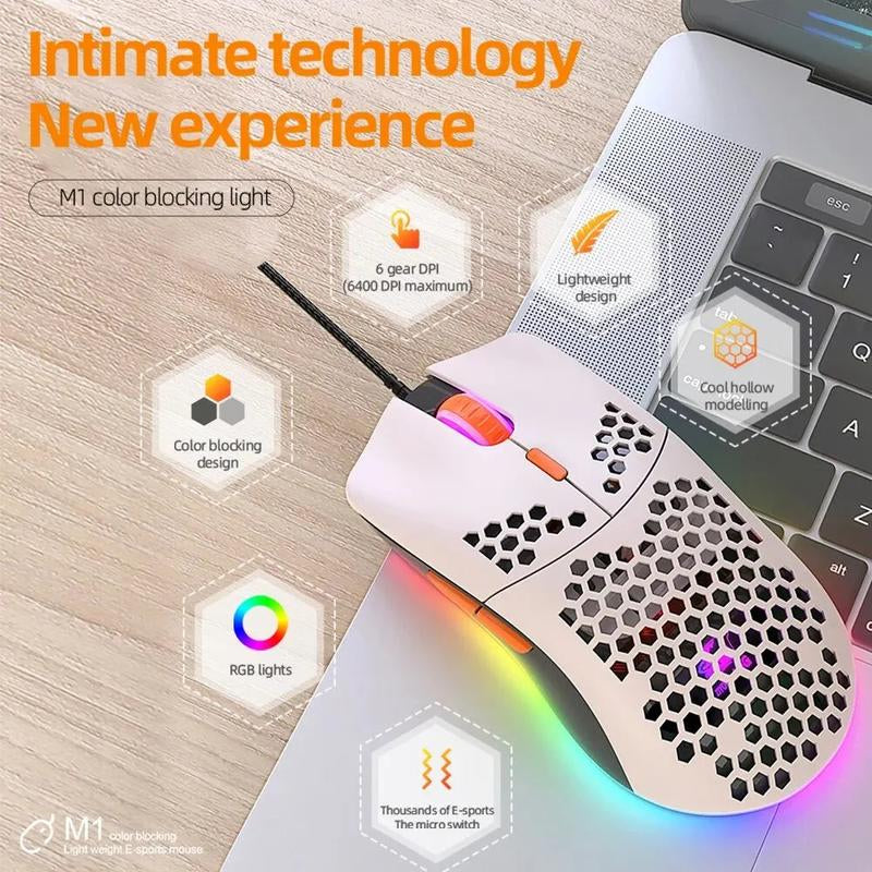Colorful gaming mouse with RGB lighting on a wooden surface next to a laptop.